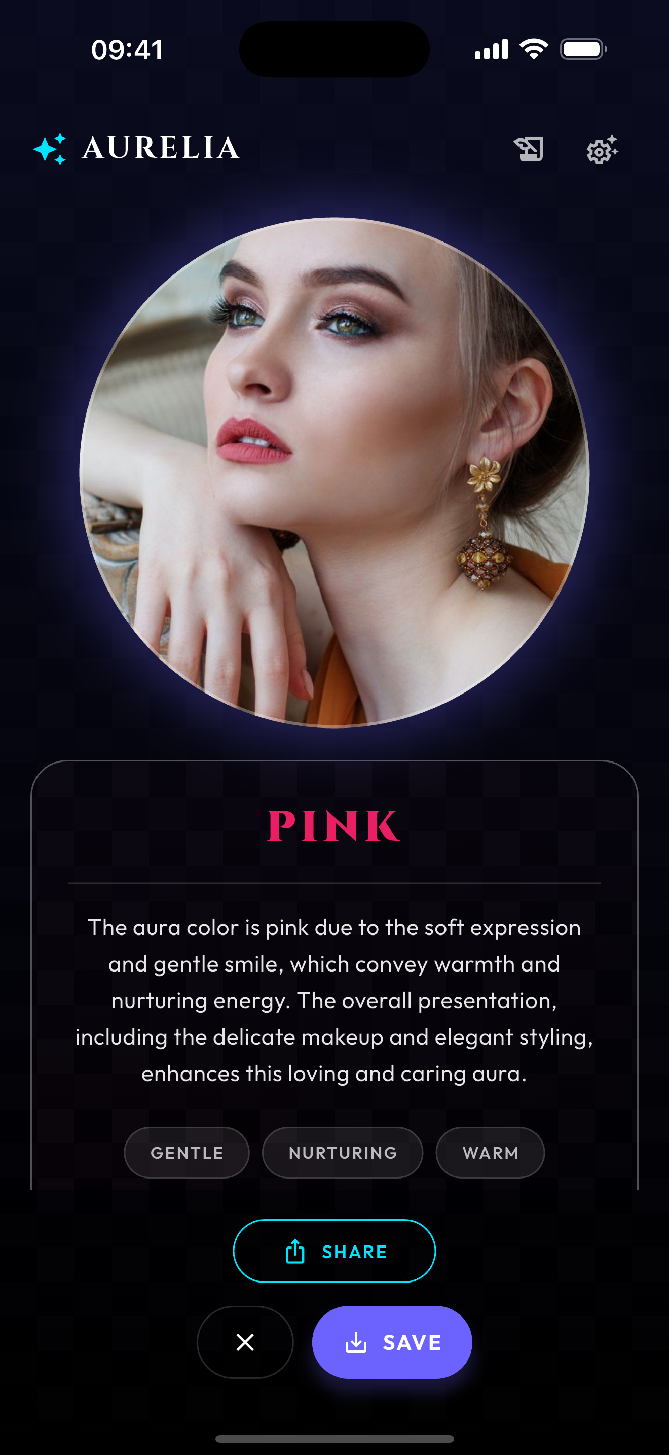 Aurelia app revealing a pink aura reading with traits